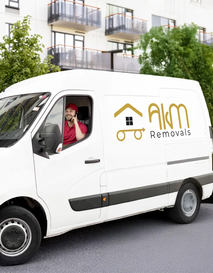 AKM Removals branded van with driver